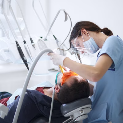 Dentist-performing-procedure-on-dental-patient