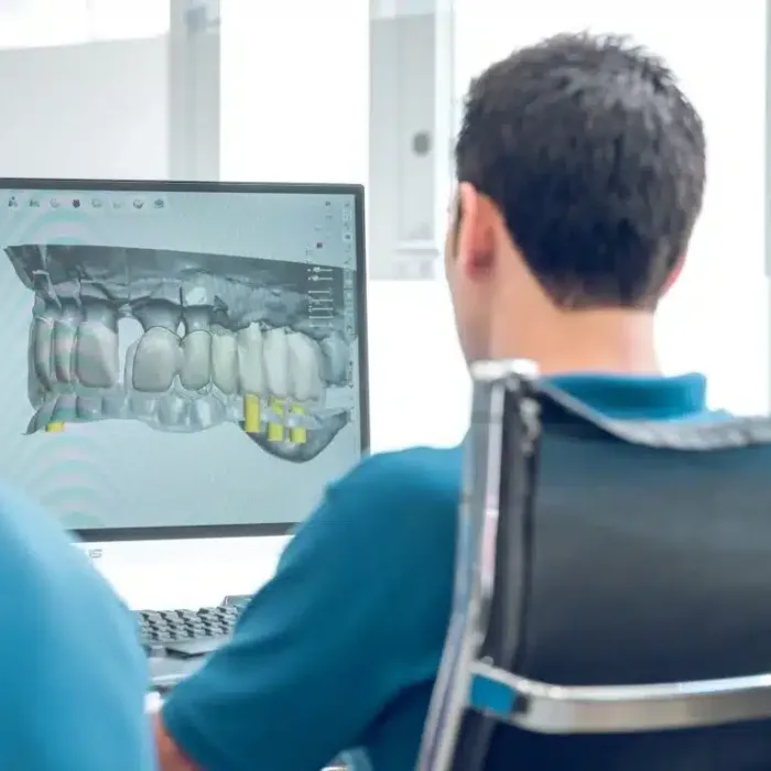dentist-working-with-digital-teeth-image-in-dental-clinic-1024x768